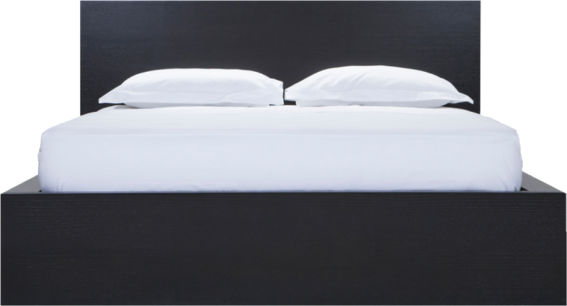 a bed with two pillows on top of it