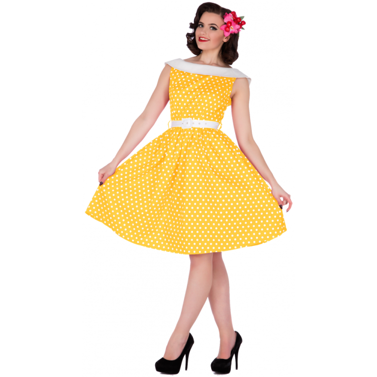 a woman wearing a yellow and white polka dress