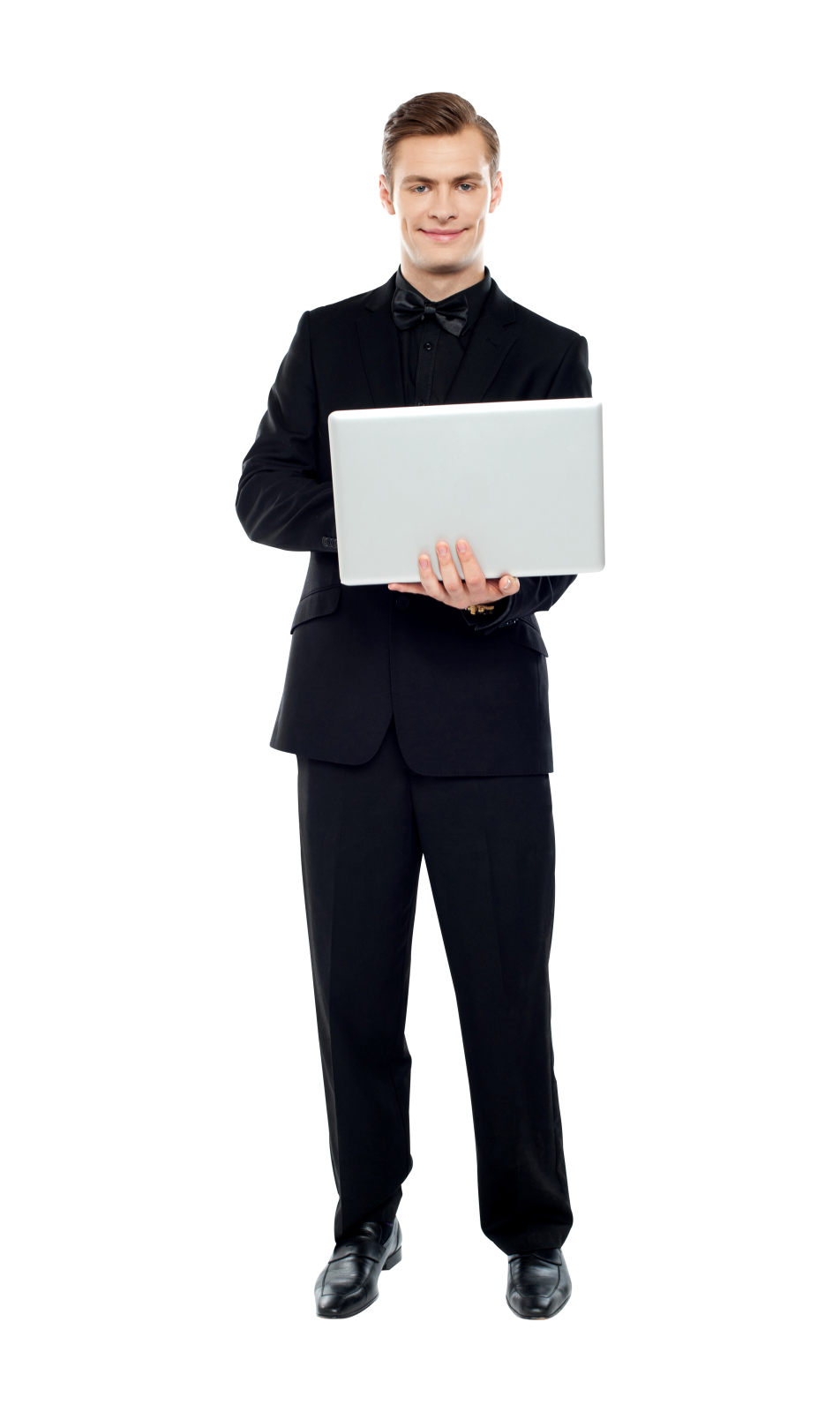 a man in a suit holding a laptop