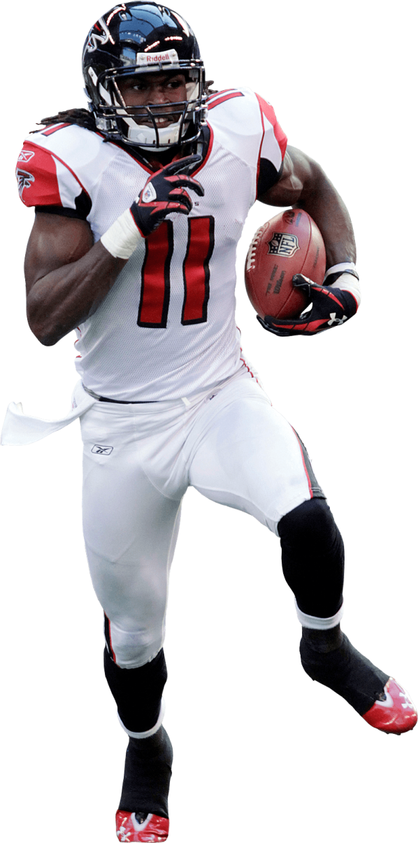 a football player is running with the ball
