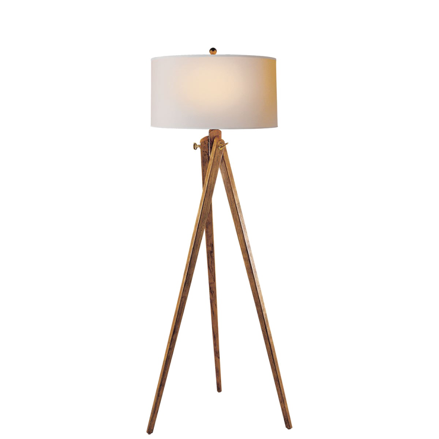 a wooden floor lamp with a white shade