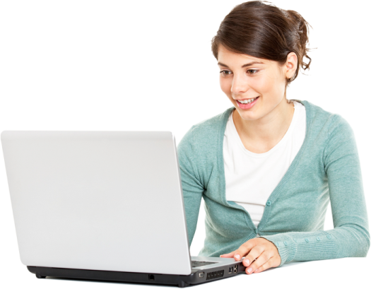 a woman sitting at a table with a laptop