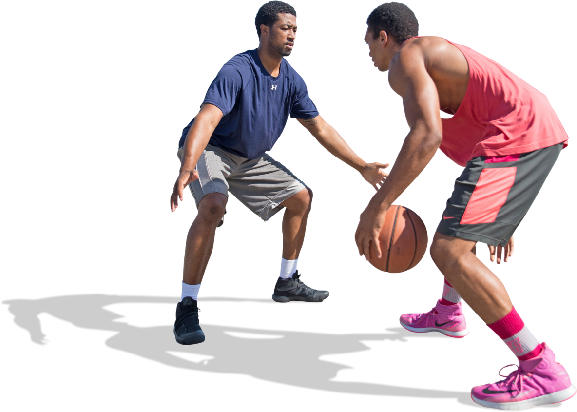 two men playing basketball