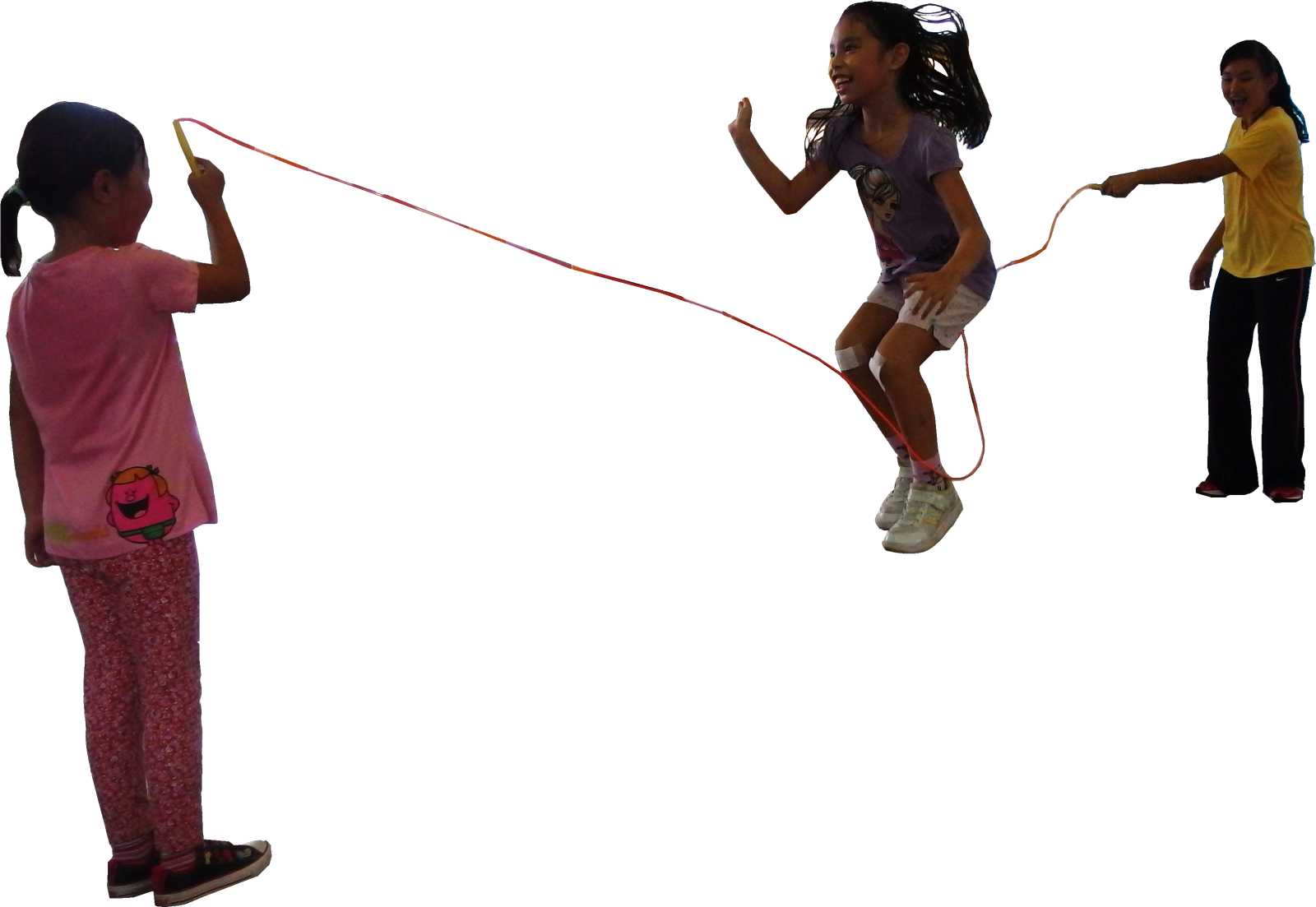 a little girl flying a kite in the air