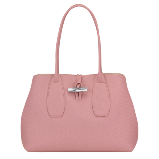 a pink handbag on a white background