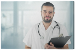 a man in a white shirt holding a clipboard