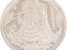 a silver coin with an image of the goddess