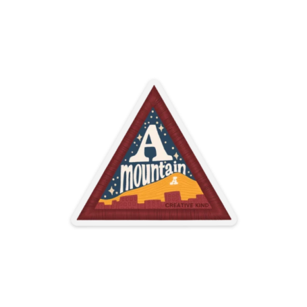 the mountain logo on a triangle sticker