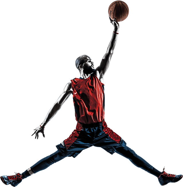 a basketball player jumping in the air with a ball
