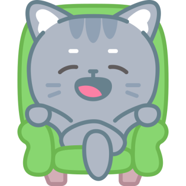 a gray cat sitting in a green chair