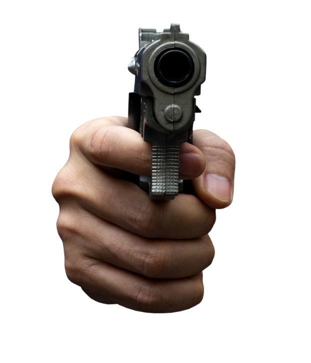 a person holding a gun in their hand