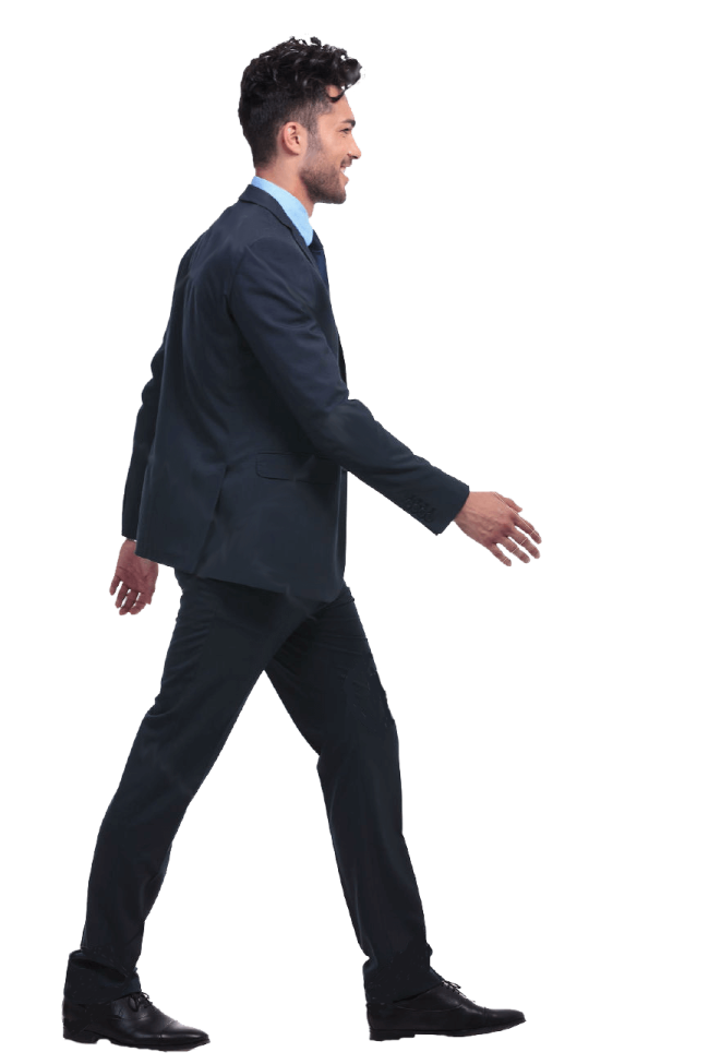 a man in a suit and tie walking