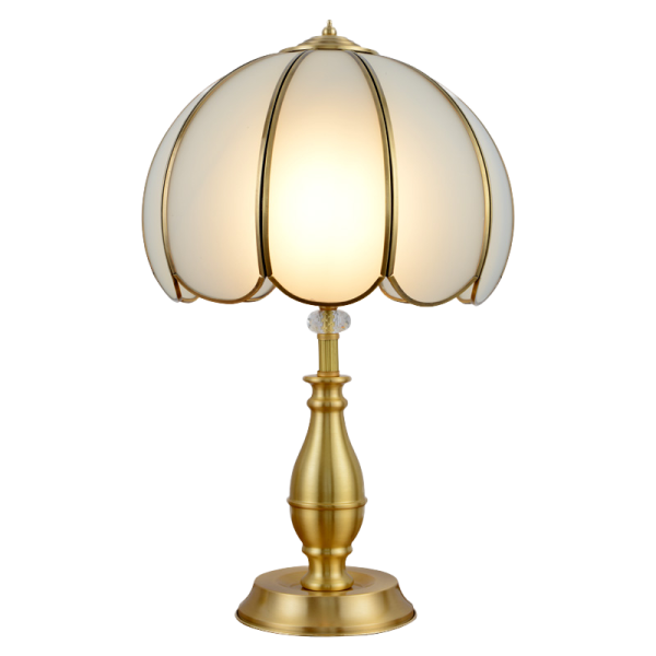 a brass table lamp with a white glass shade