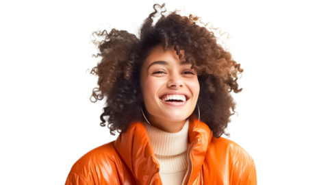 a woman wearing an orange leather jacket and smiling