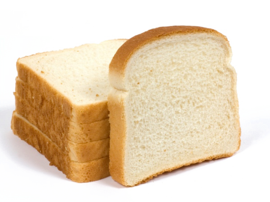 a loaf of white bread on a white background
