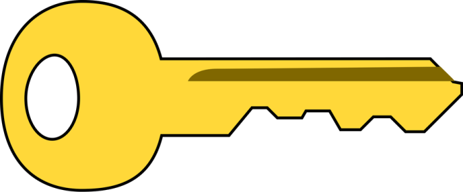 a yellow key with a brown handle