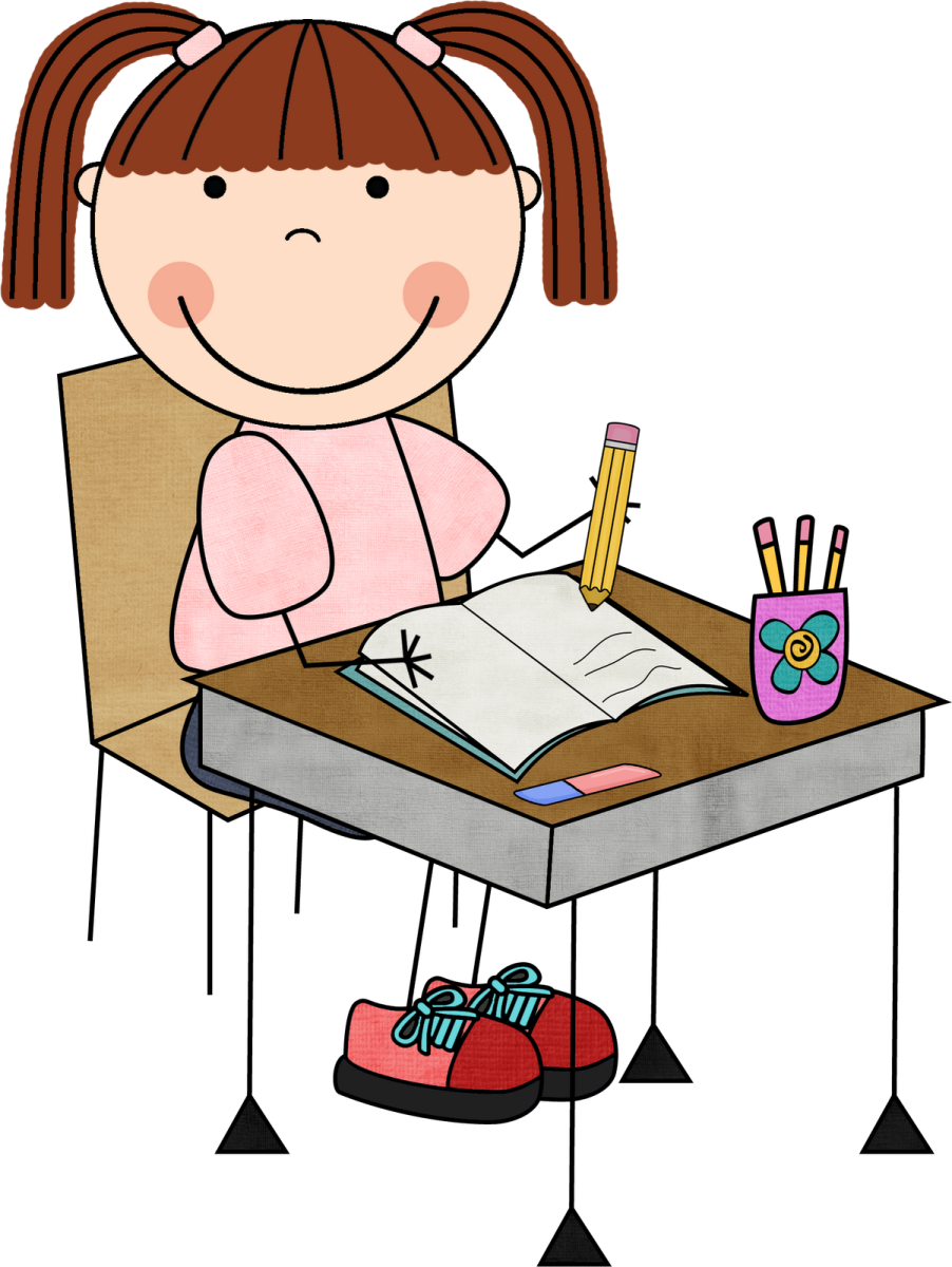 a girl sitting at her desk writing