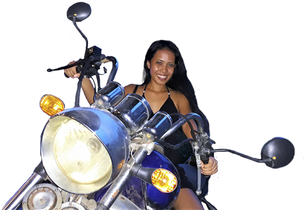 a woman sitting on the back of a motorcycle