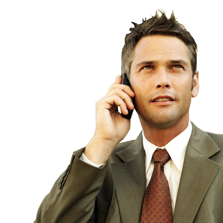 a man in a suit talking on a cell