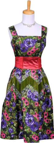 a green dress with pink flowers on it