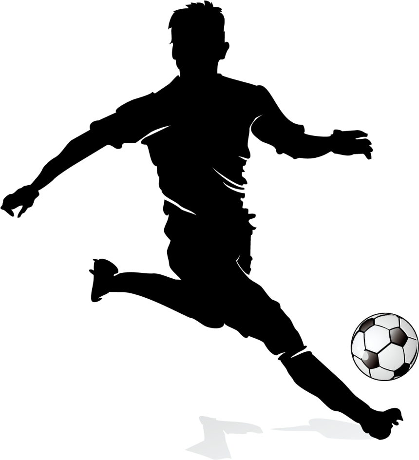 a silhouette of a soccer player kicking the ball