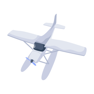 a small white airplane flying through the air