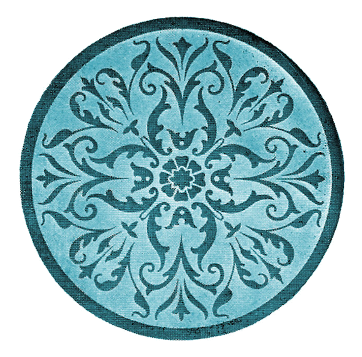 a circular rug with an ornate design on it