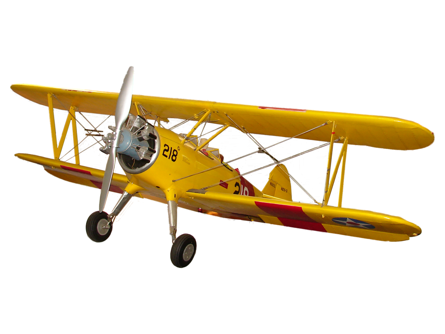 a small yellow airplane flying in the sky