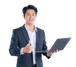 a man in a suit holding a laptop