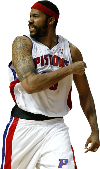 a man in a white shirt and red headband playing basketball