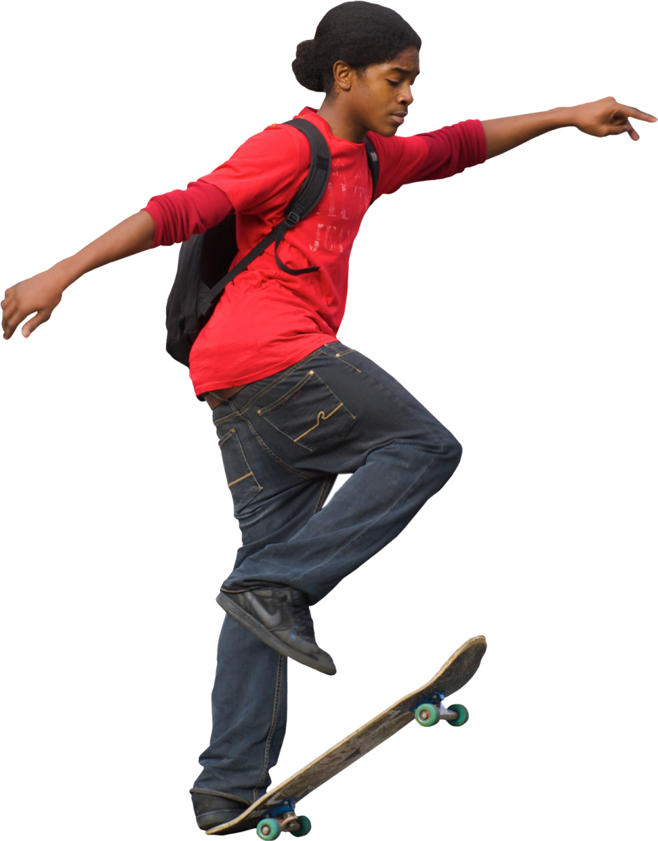 a young boy is doing a trick on his skateboard