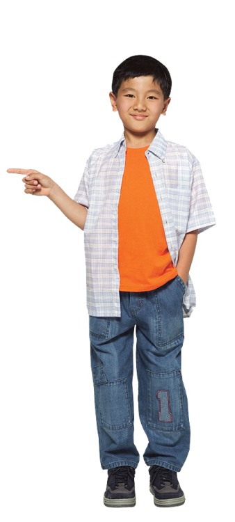 a young boy wearing an orange shirt and blue jeans