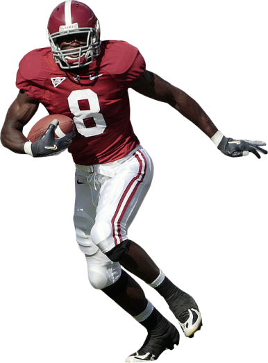 a football player is running with the ball