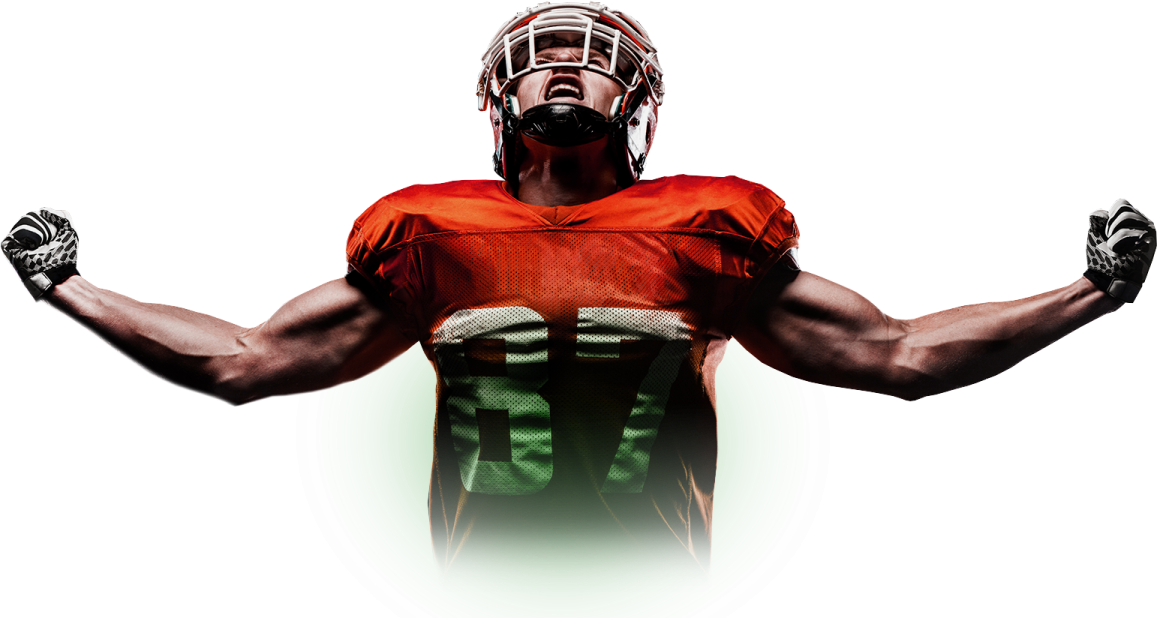 a man in an orange and green uniform holding his hands up