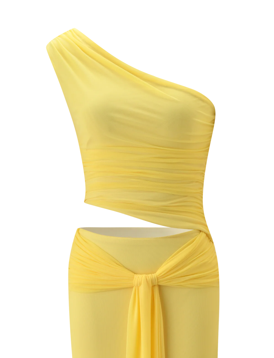 a woman wearing a yellow one shoulder dress