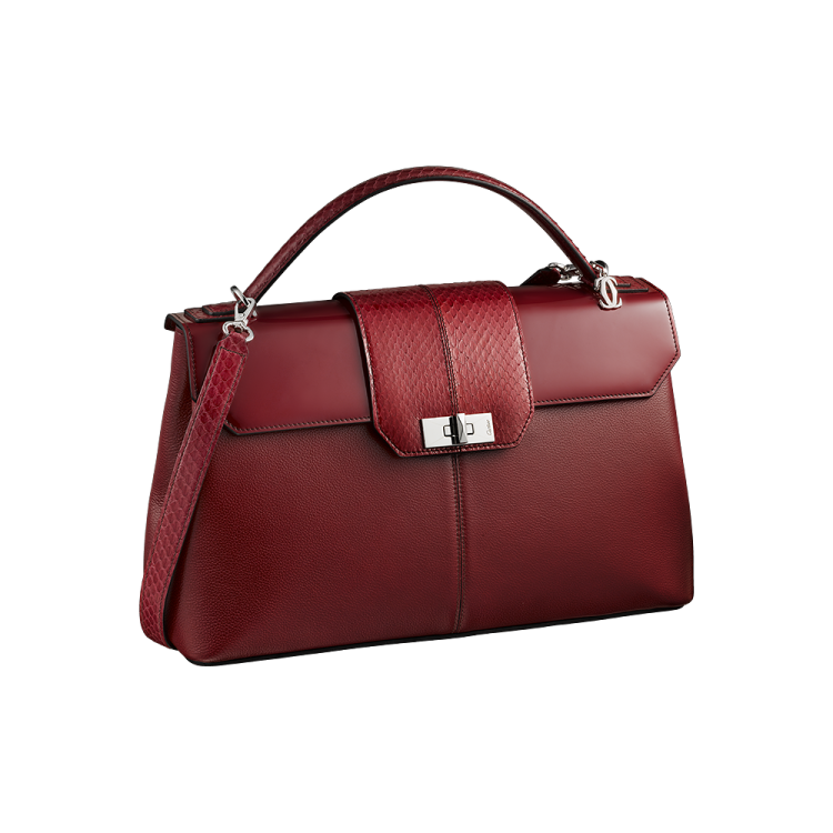 a red handbag on a white background