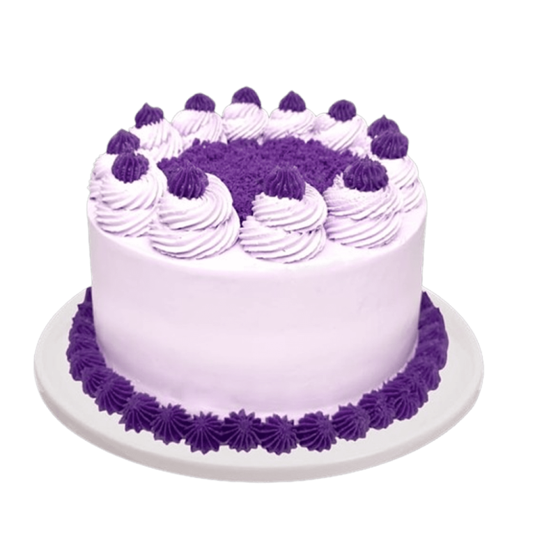 a white cake with purple frosting on top