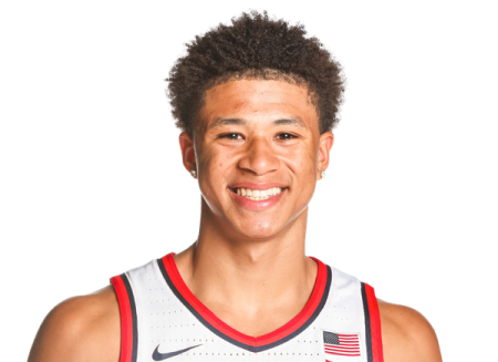 a young man in a white and red uniform