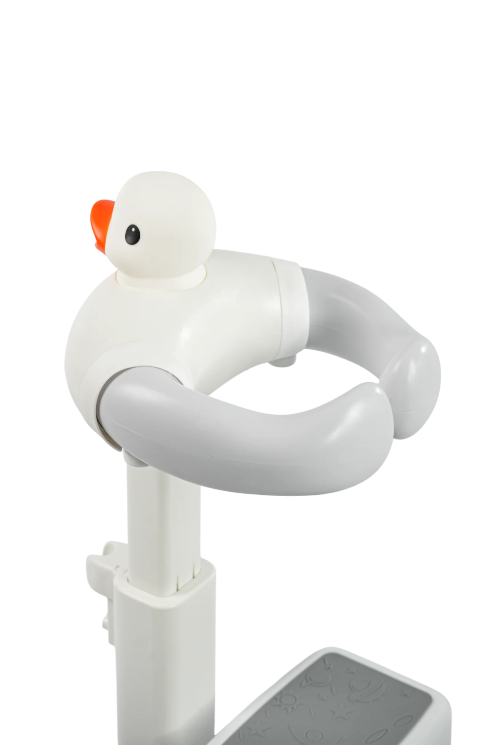 a white bird sitting on top of a sink