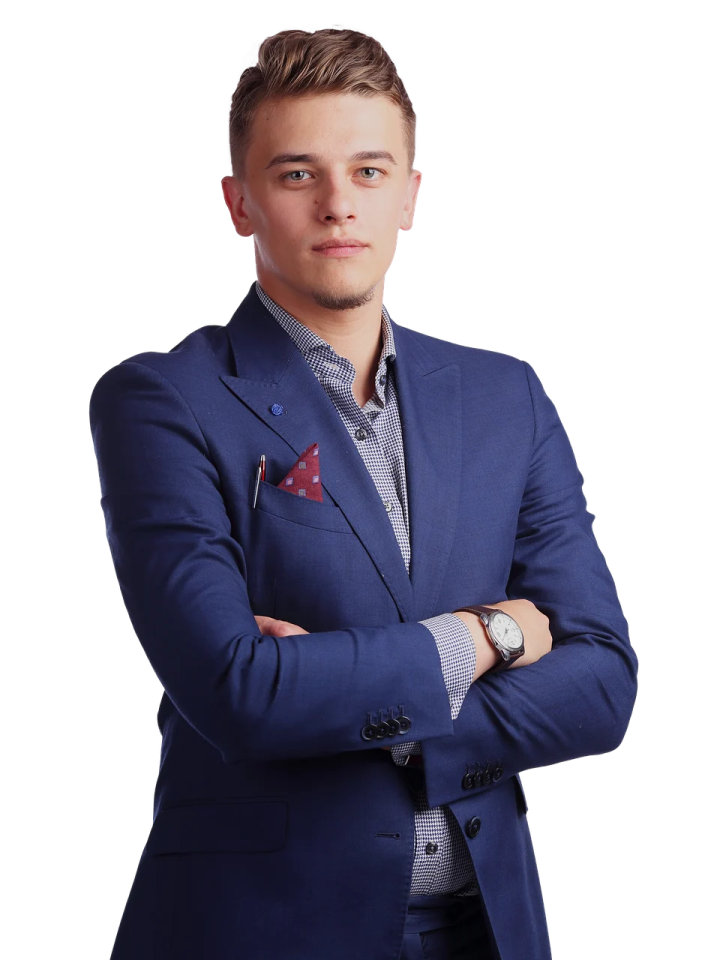 a man in a blue suit with his arms crossed