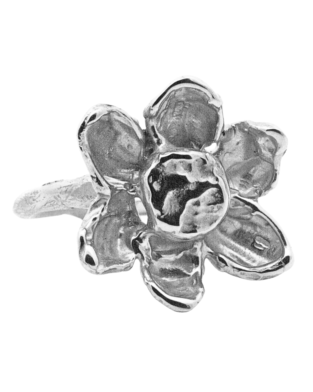 a silver flower ring on white background