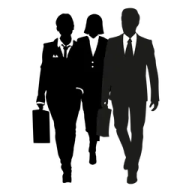 silhouettes of two people walking down the street