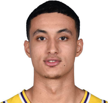 a close up of a basketball player's face