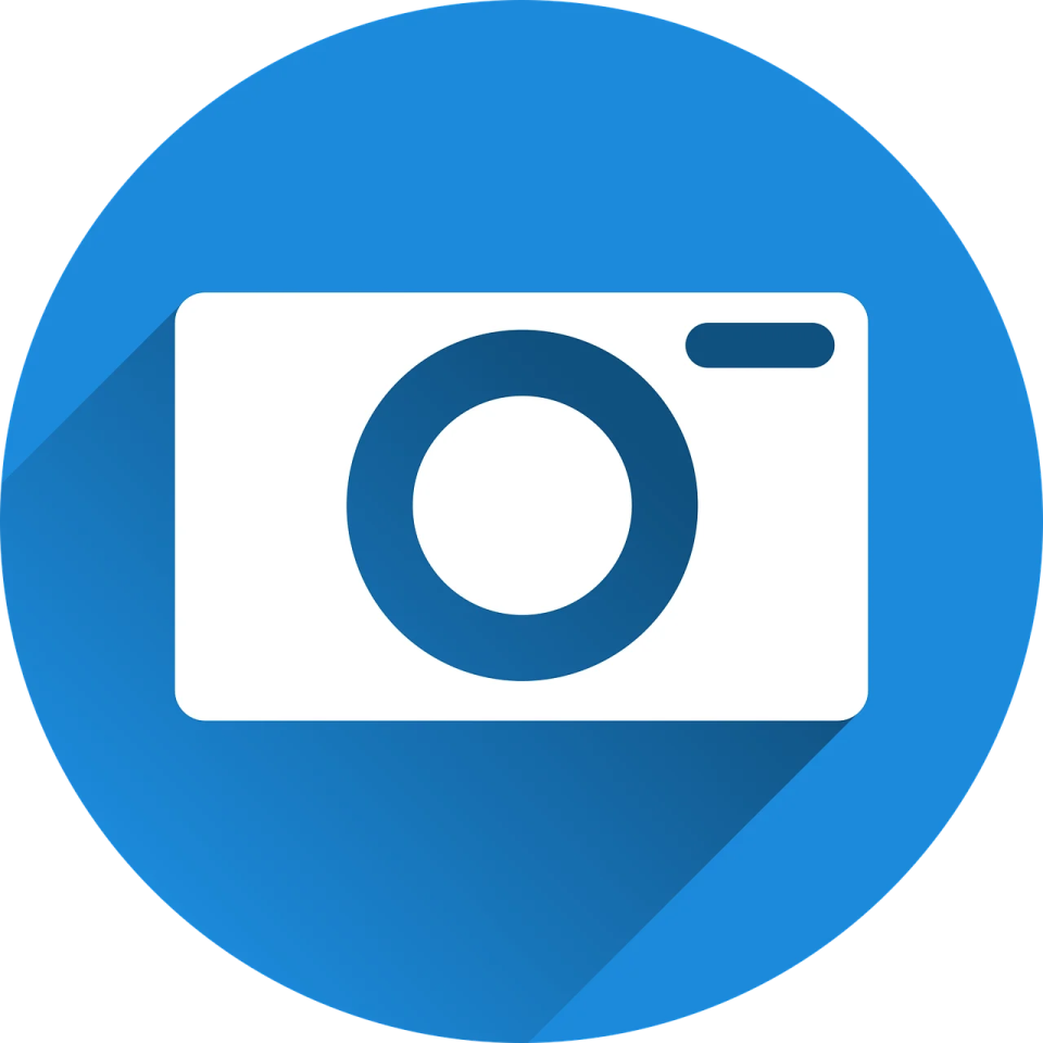 a camera icon with a long shadow
