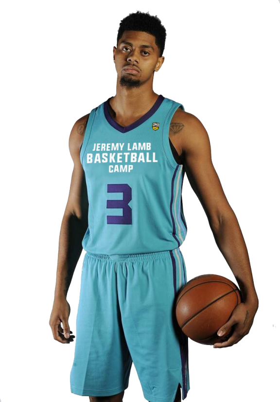a man in a blue uniform holding a basketball ball