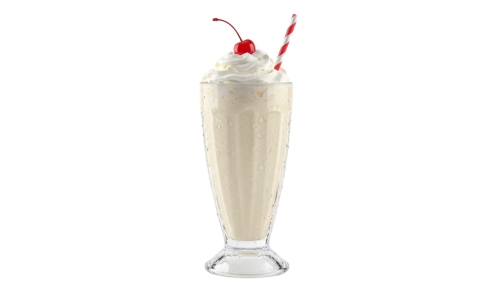 a tall glass filled with ice and whipped cream
