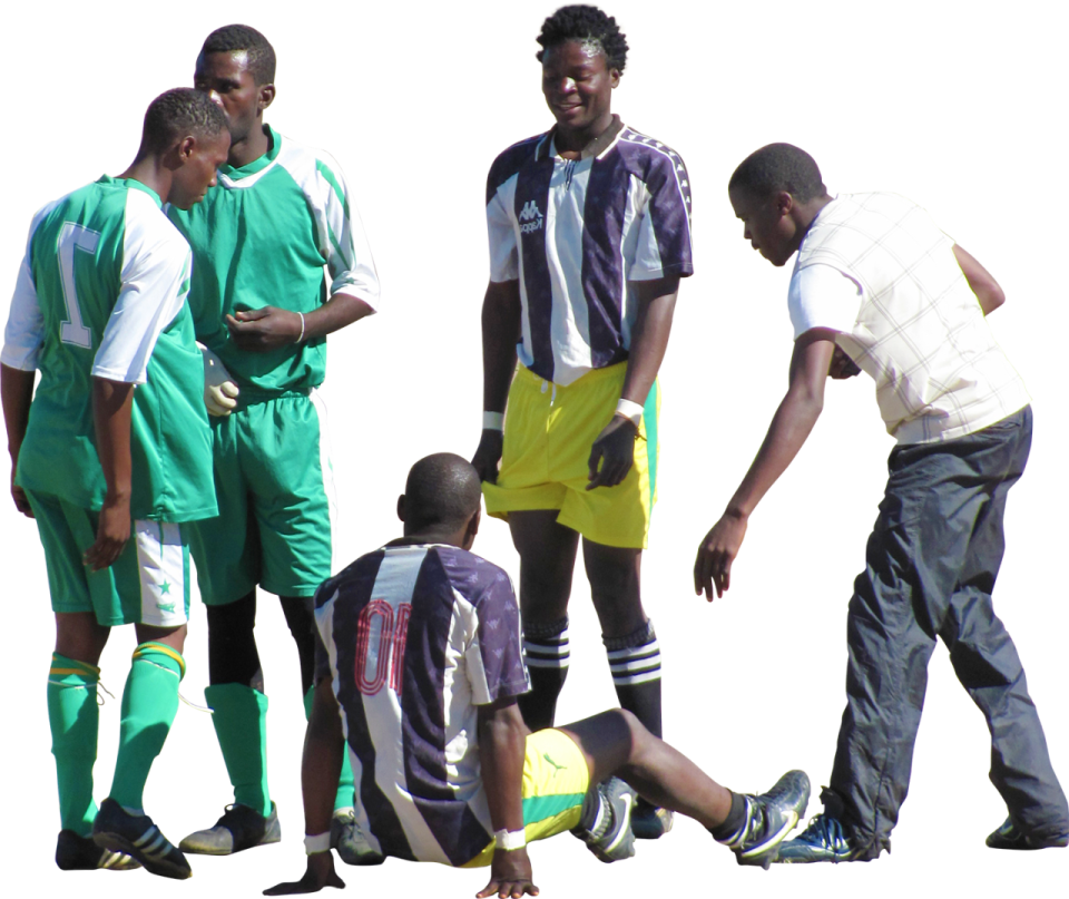 a group of men playing soccer together