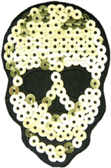 a skull made out of white and black beads