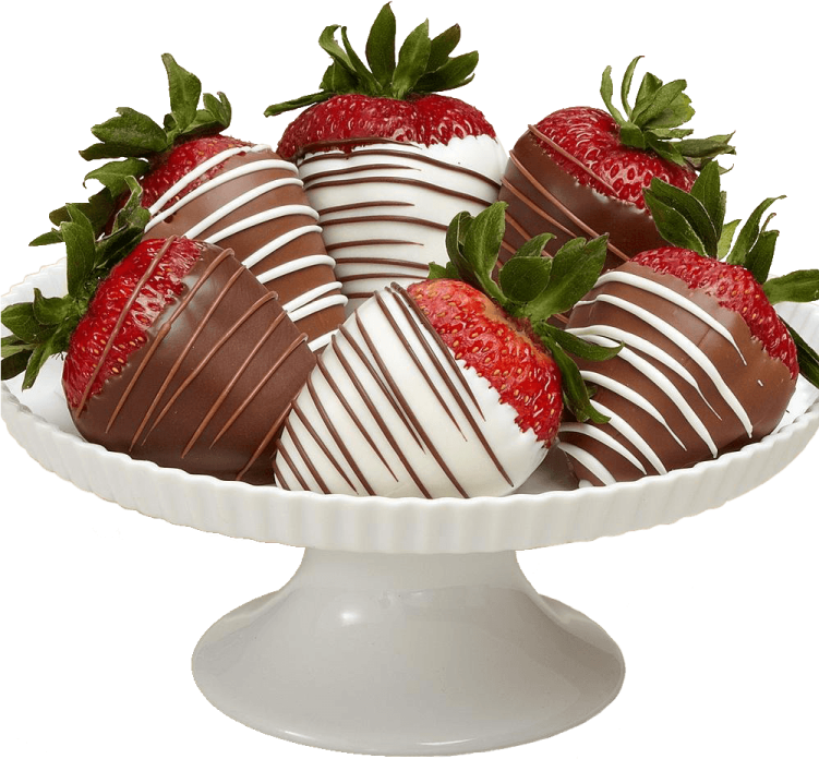 chocolate covered strawberries on a white cake stand