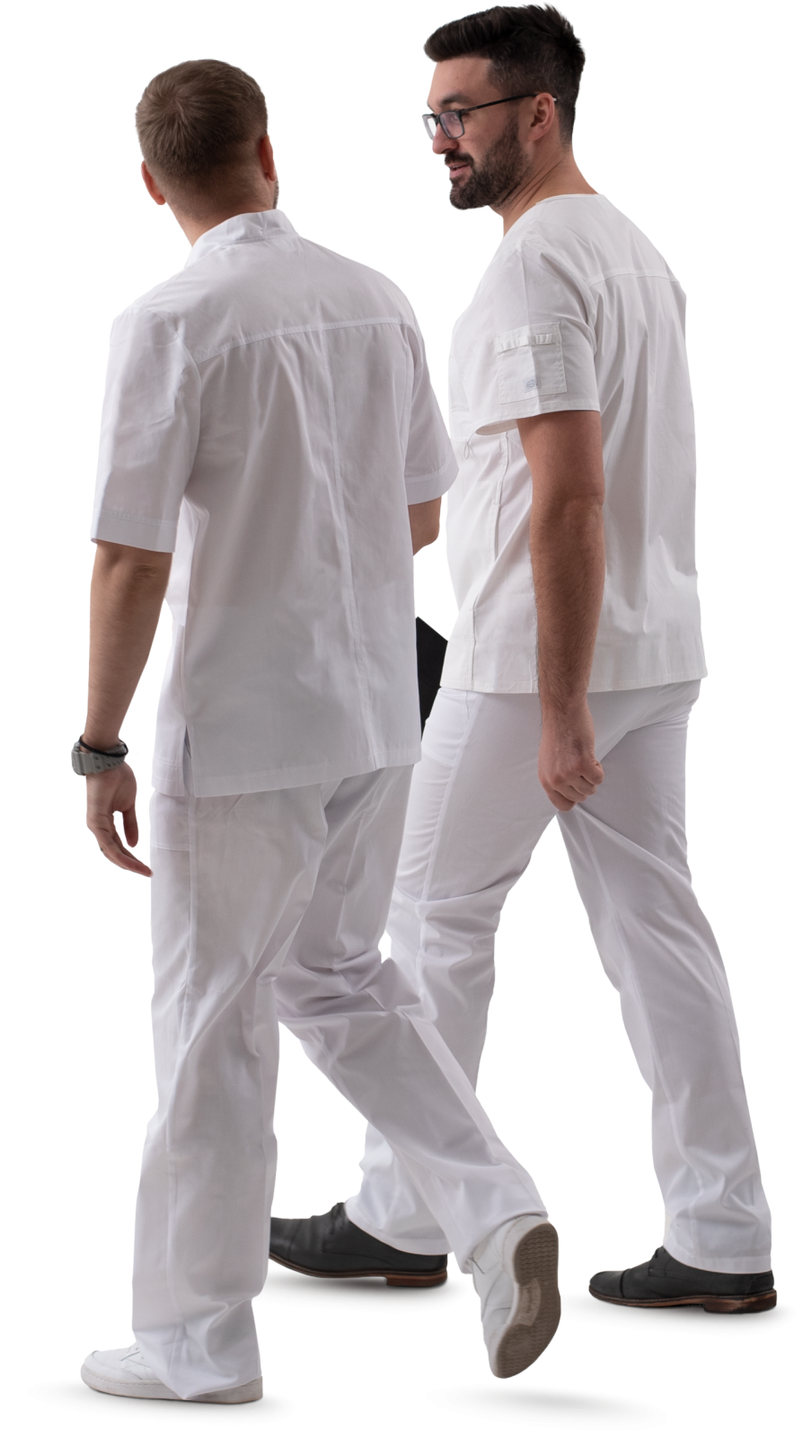 two men in white scrubs walking together